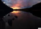 Sunset over calm lake