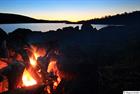 Campfire under the night sky