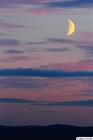 Half-moon over Swedish Lapland