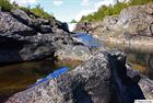 Stone pool by the river