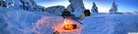 Warm campfire in the freezing landscapev